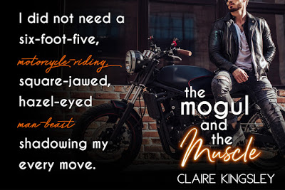 Handsome bearded biker with classic style black motorcycle. Cafe racer.